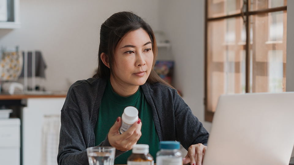 Woman holding prescription