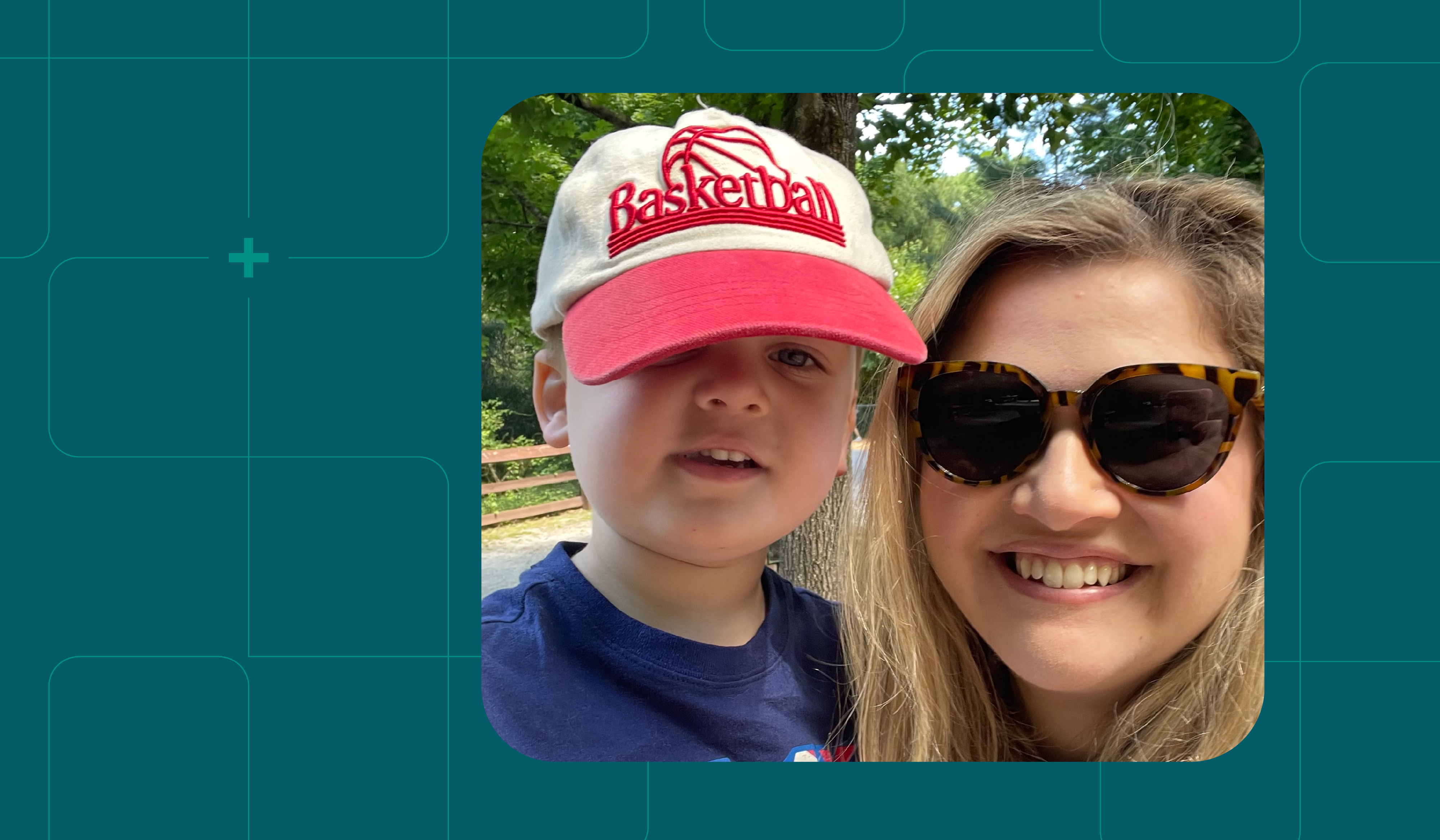 Boy in red cap and woman with sunglasses smiling together