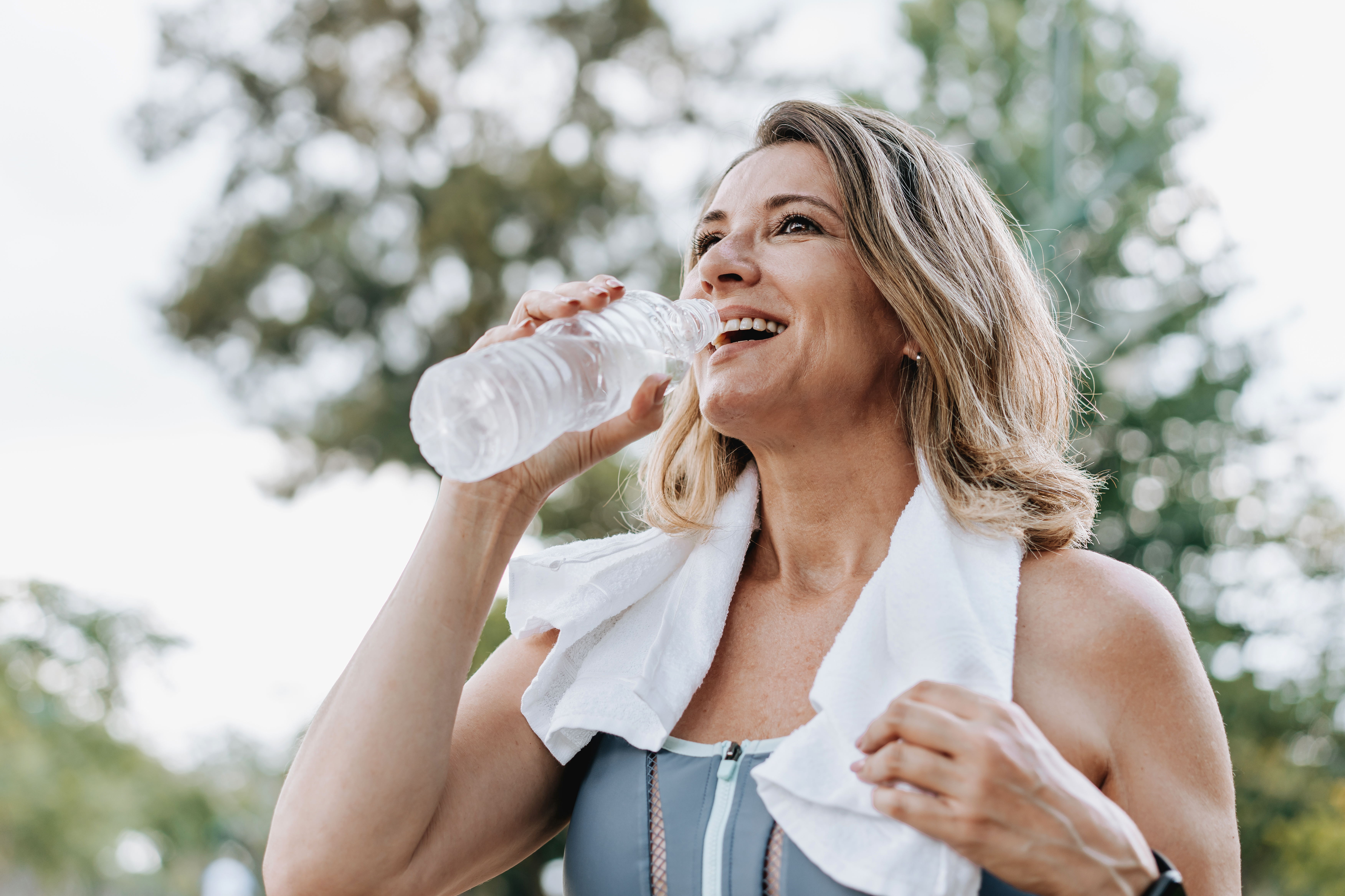 A woman drinks water