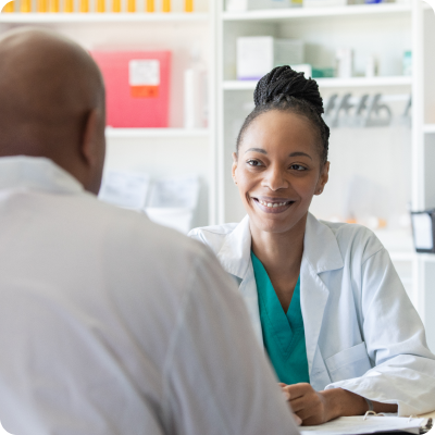 Doctor helps patient