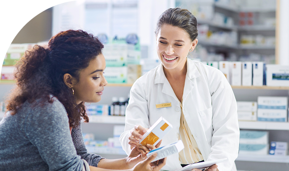 Pharmacist helps customer