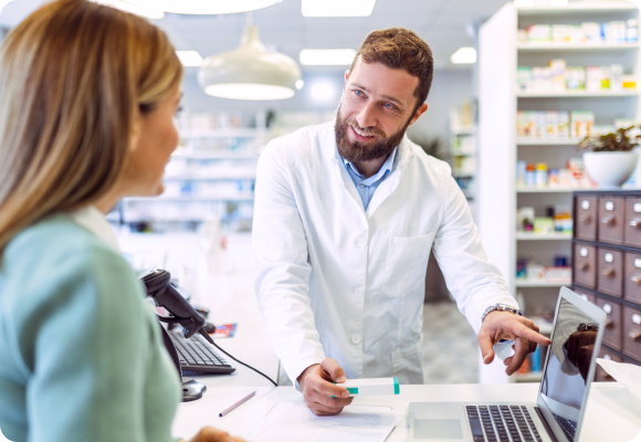 Pharmacist helps customer