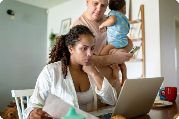 family looking at computer