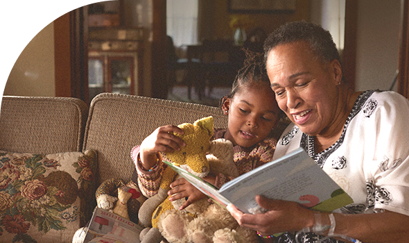 grandma reading granddaughter story