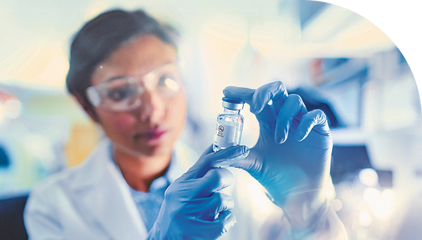 woman with gloves and bottle