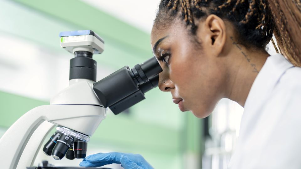 Woman with microscope