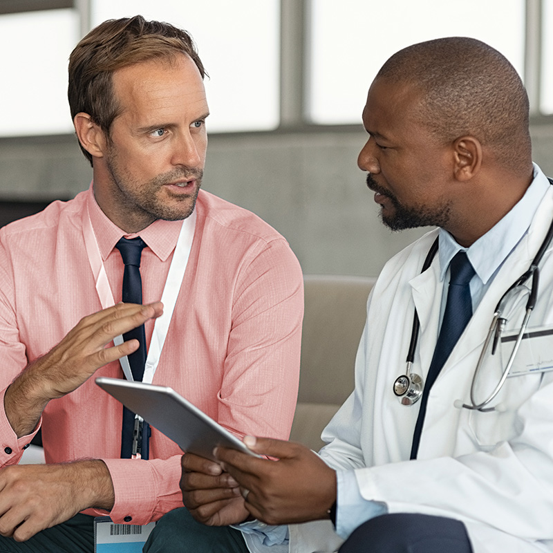doctor talking to man