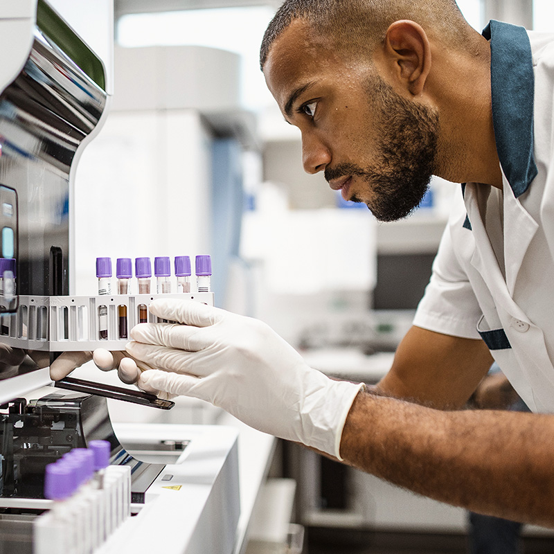 man with tests in lab