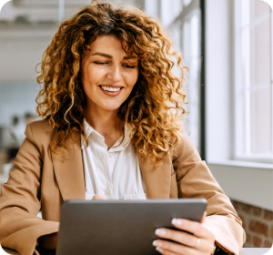 woman with tablet and blazer 