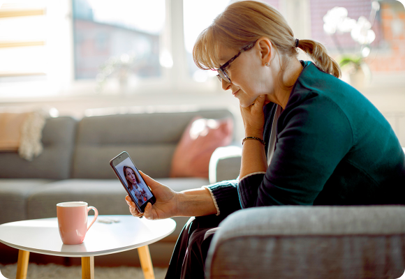 woman on virtual appointment on phone