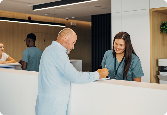 man checking into care group
