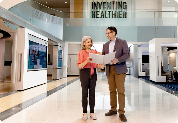 people waking in lab