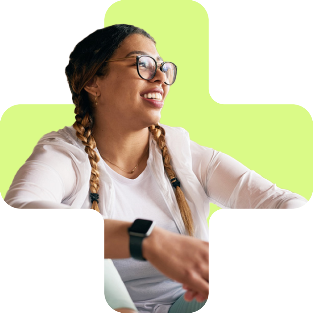 young woman wearing glasses smiling