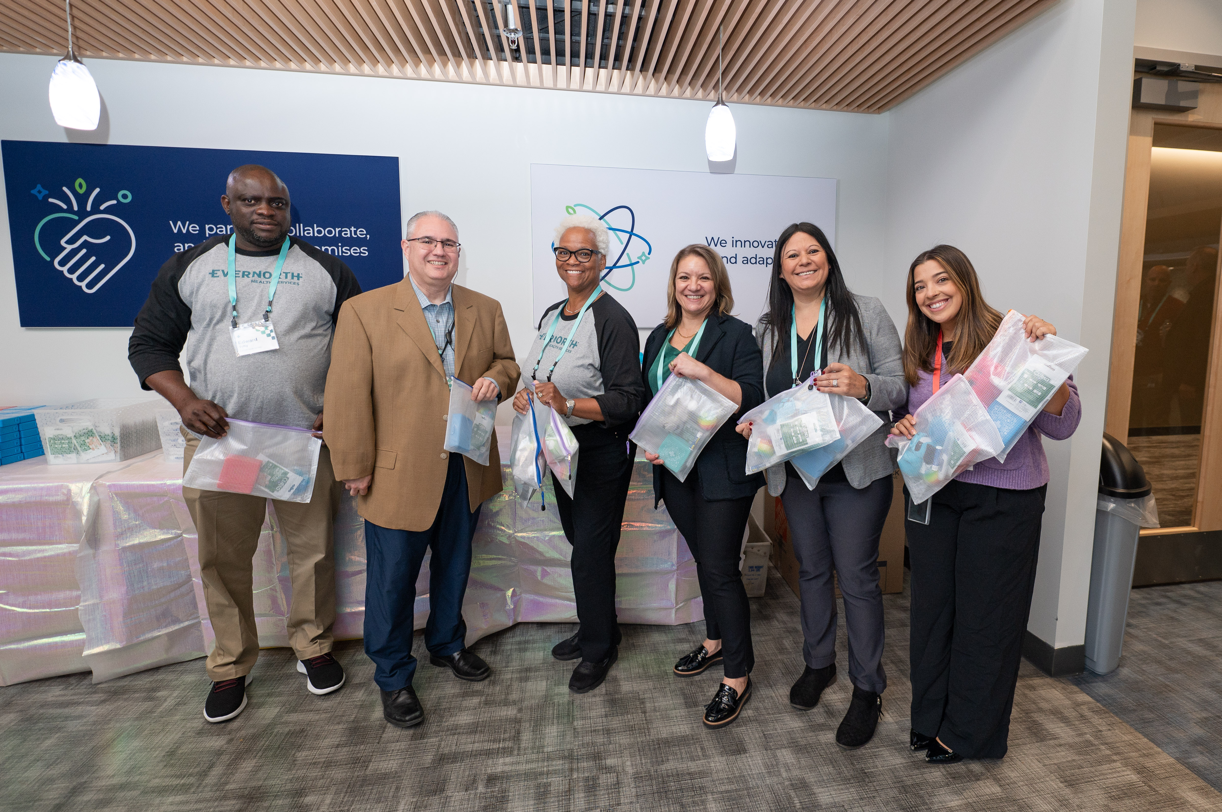 Evernorth employees pose for a group photo during a volunteer activity benefitting the Boys & Girls Clubs of America