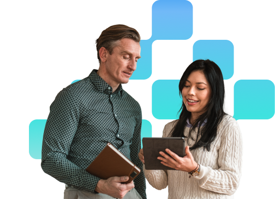 Man and woman reviewing item on digital tablet