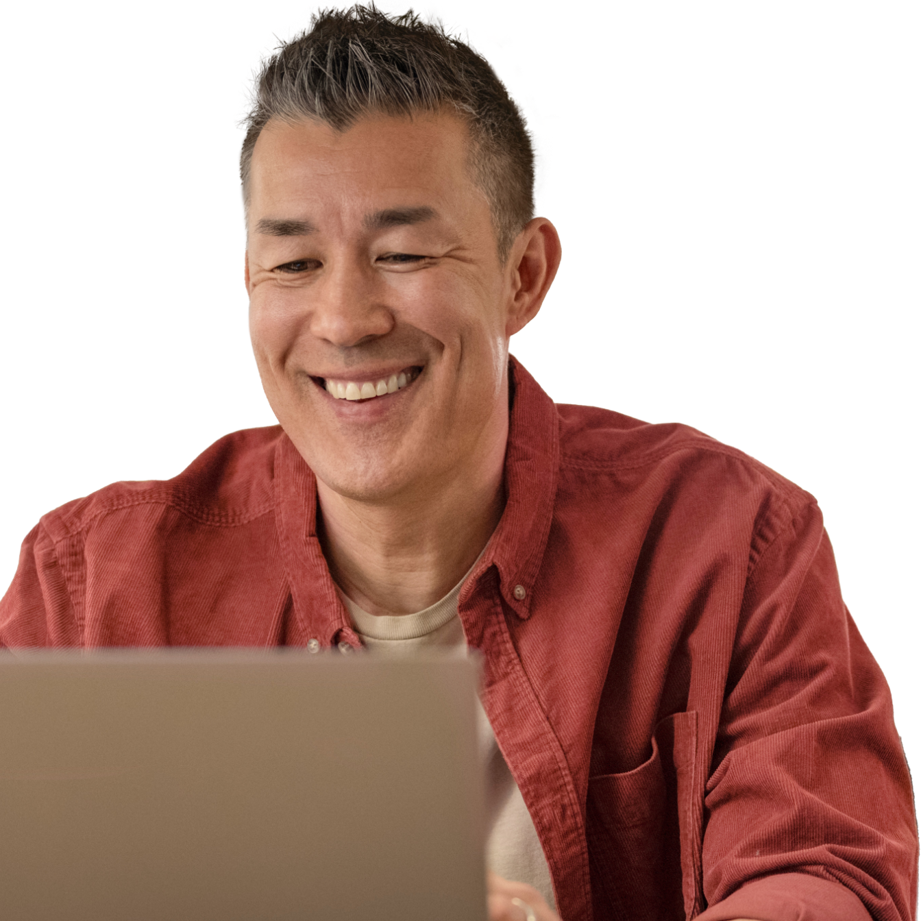 man looking at laptop smiling