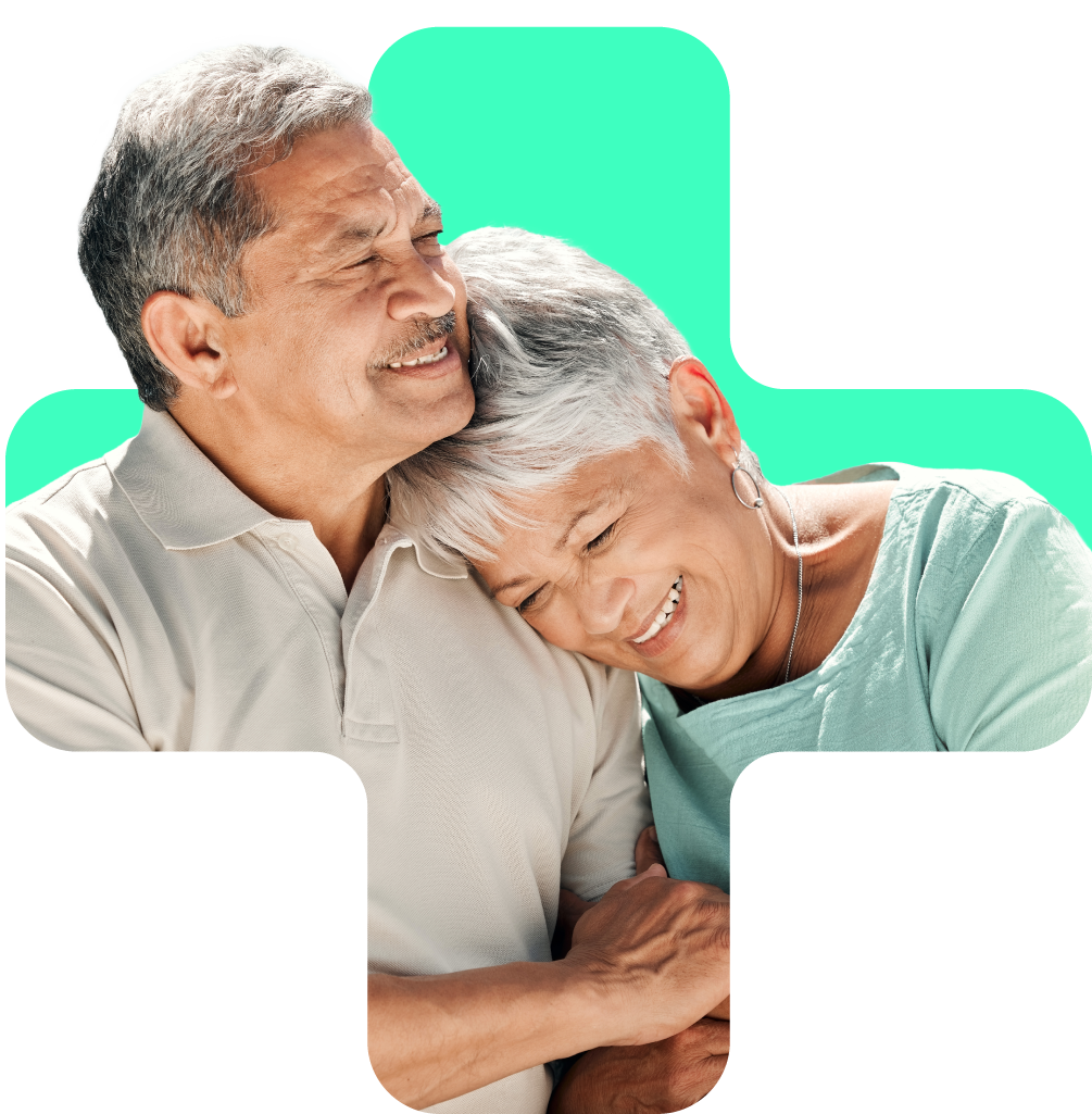 elderly couple embracing