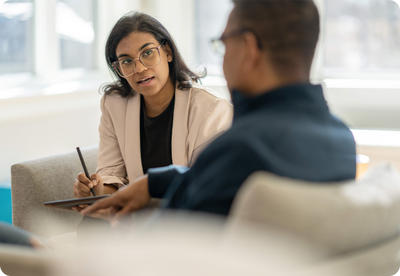 woman in suit with clip board 