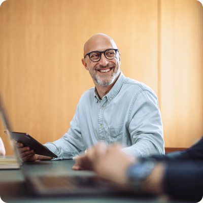 bald older white man looking to side