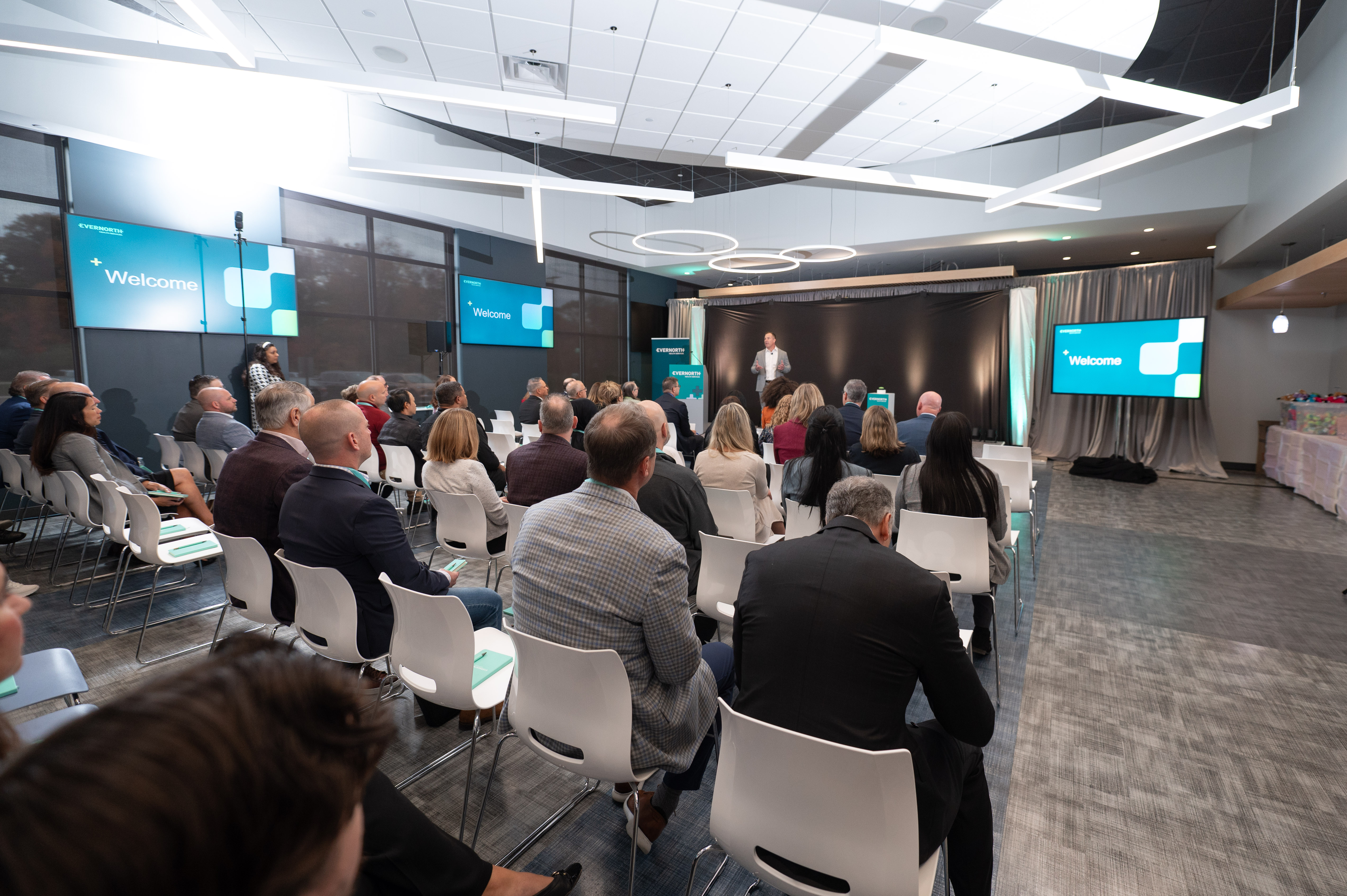 audience listens to remarks during the grand opening of a new Evernorth facility in Newark, Delaware