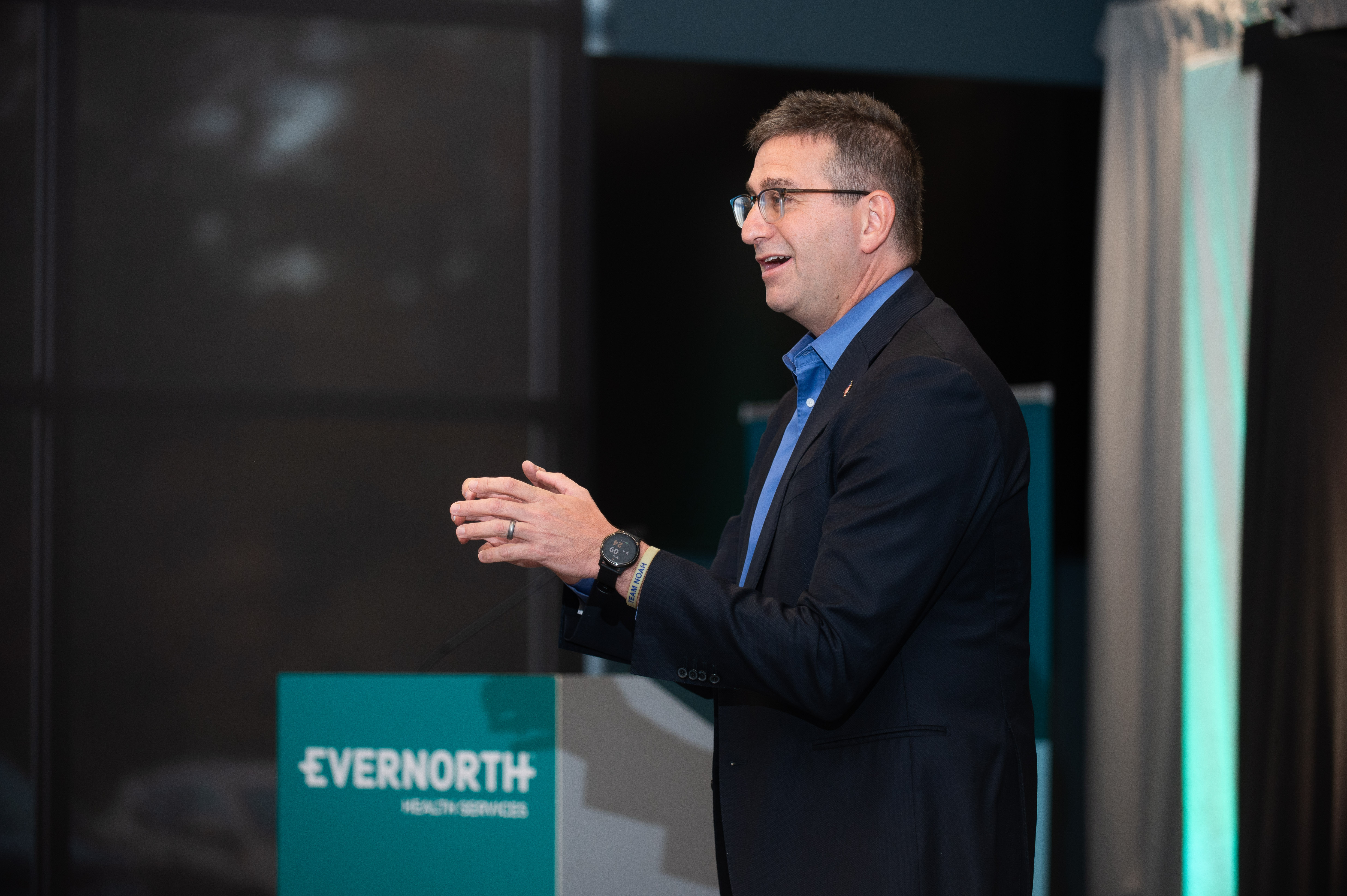 Delaware Governor Matt Meyer delivers remarks, solo at an Evernorth branded podium. 