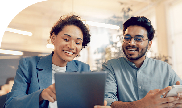 man and woman with tablet at work