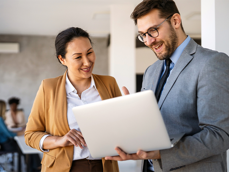 man and woman with tablet