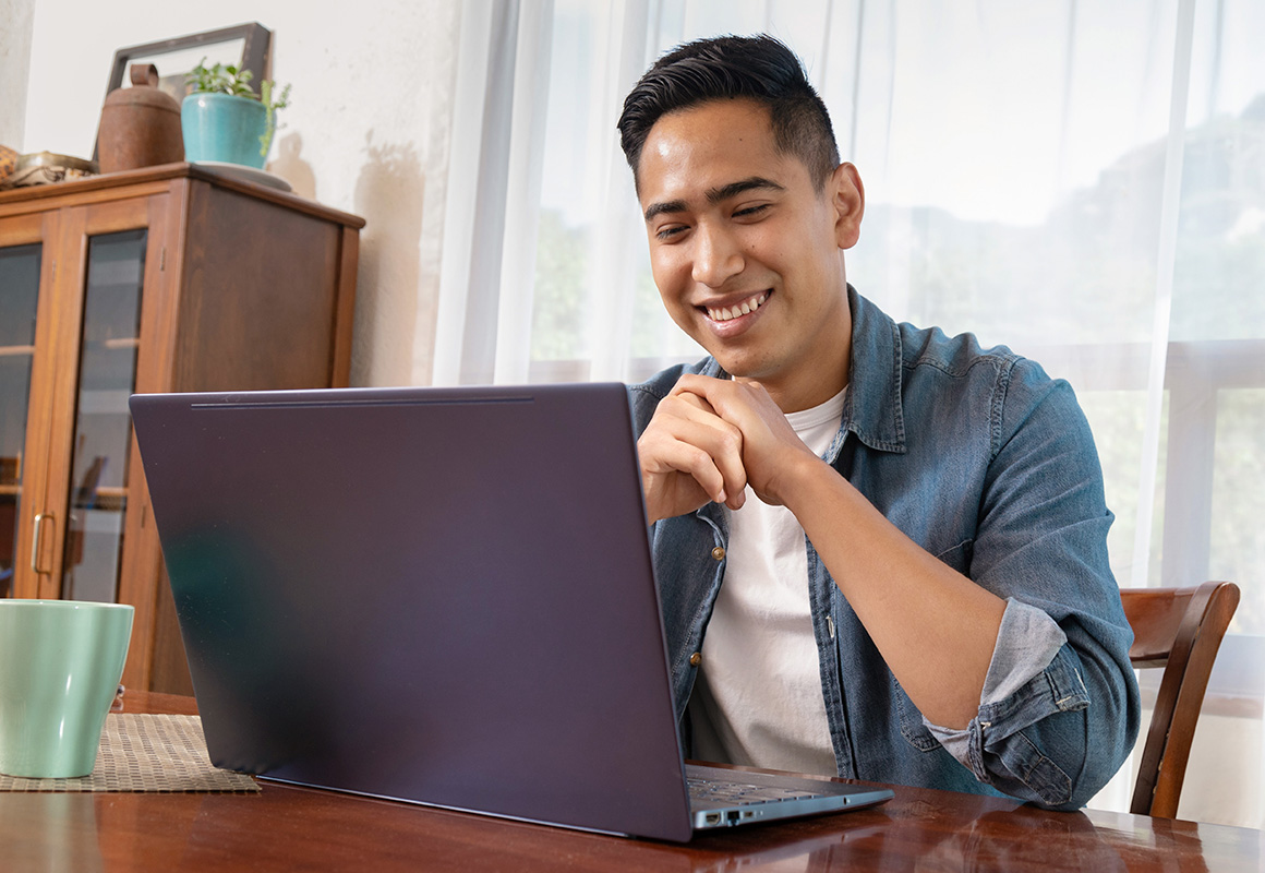 man with computer at home