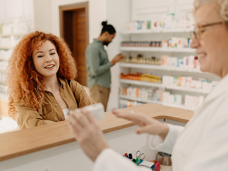 woman at pharmacy counter