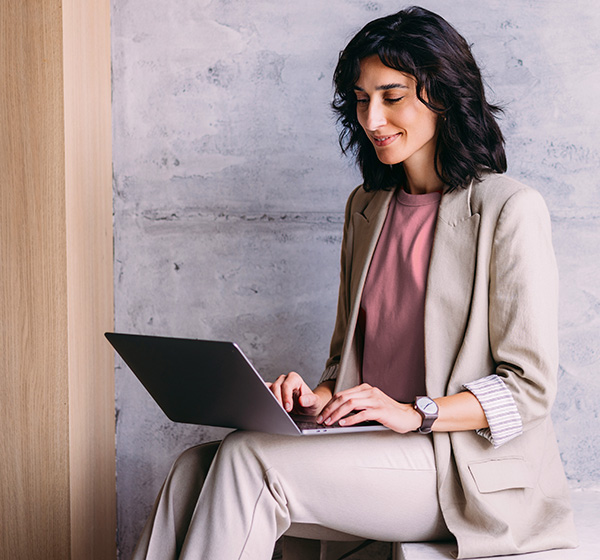 Business woman on laptop at work