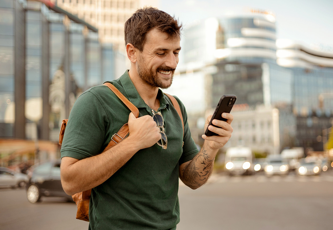 Man on his phone in the city