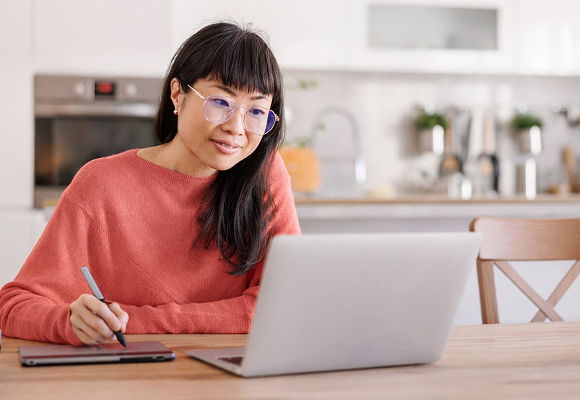 woman at home on laptop