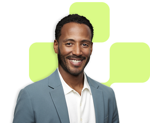 man in suit smiling in front of yellow Evernorth pattern