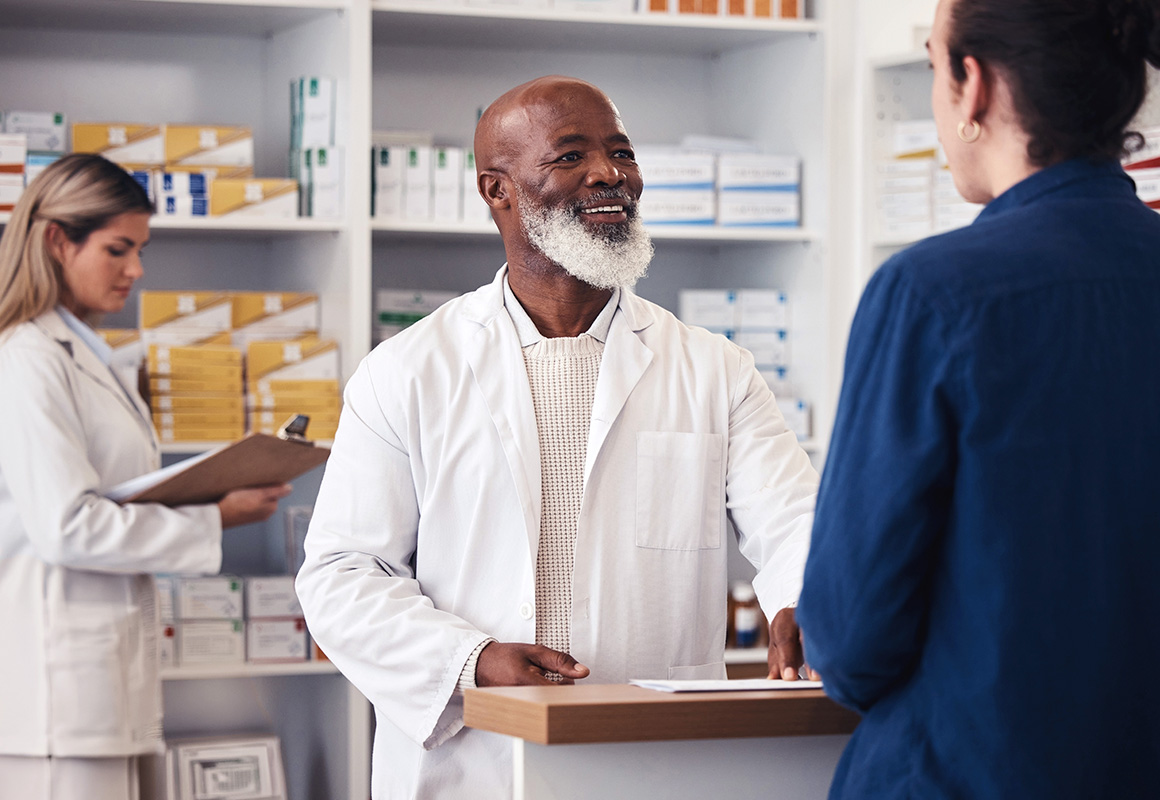 pharmacist behind counter