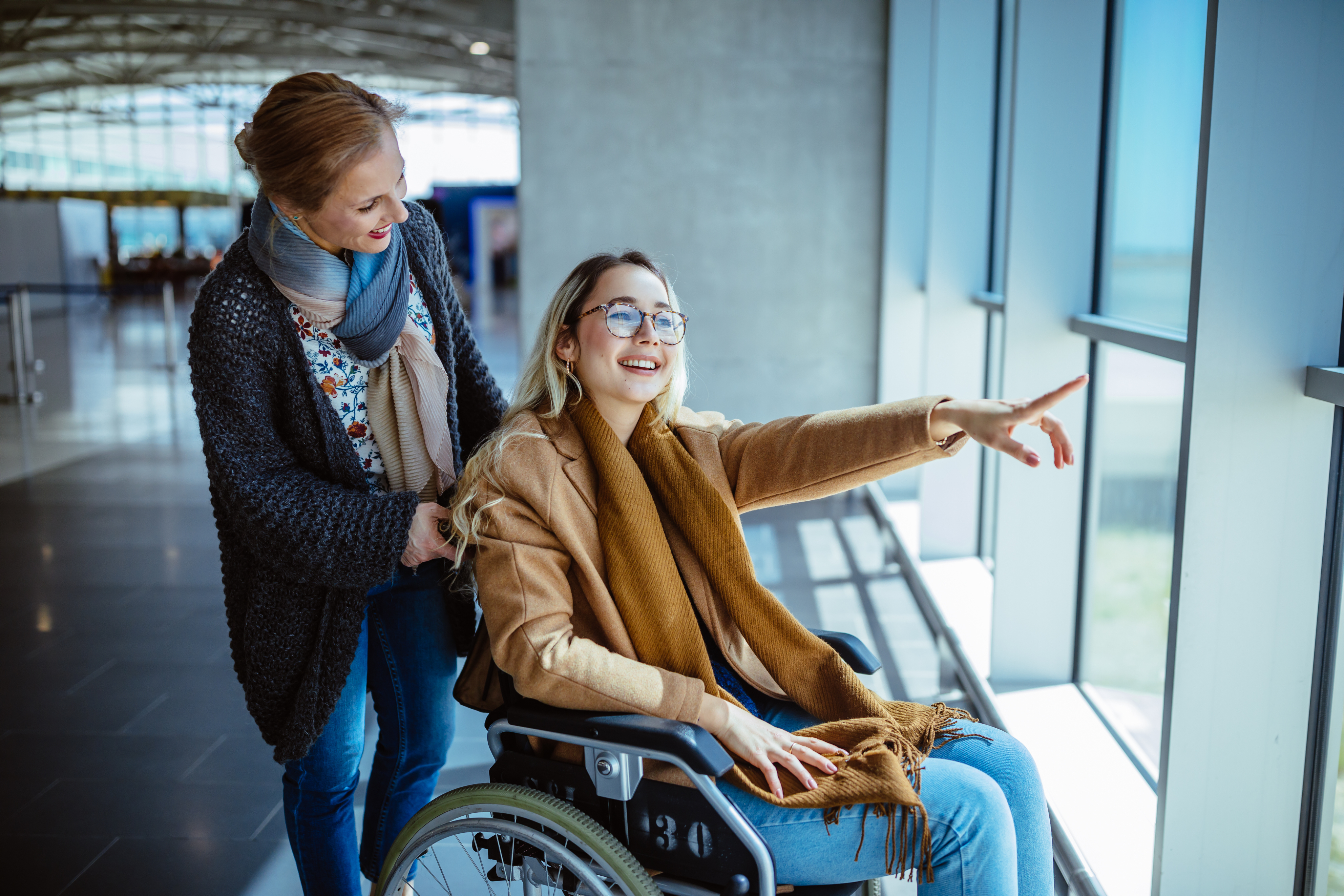two women one in wheelchair 