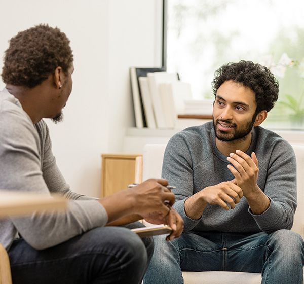 two men speaking