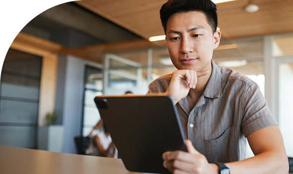 man with tablet hero