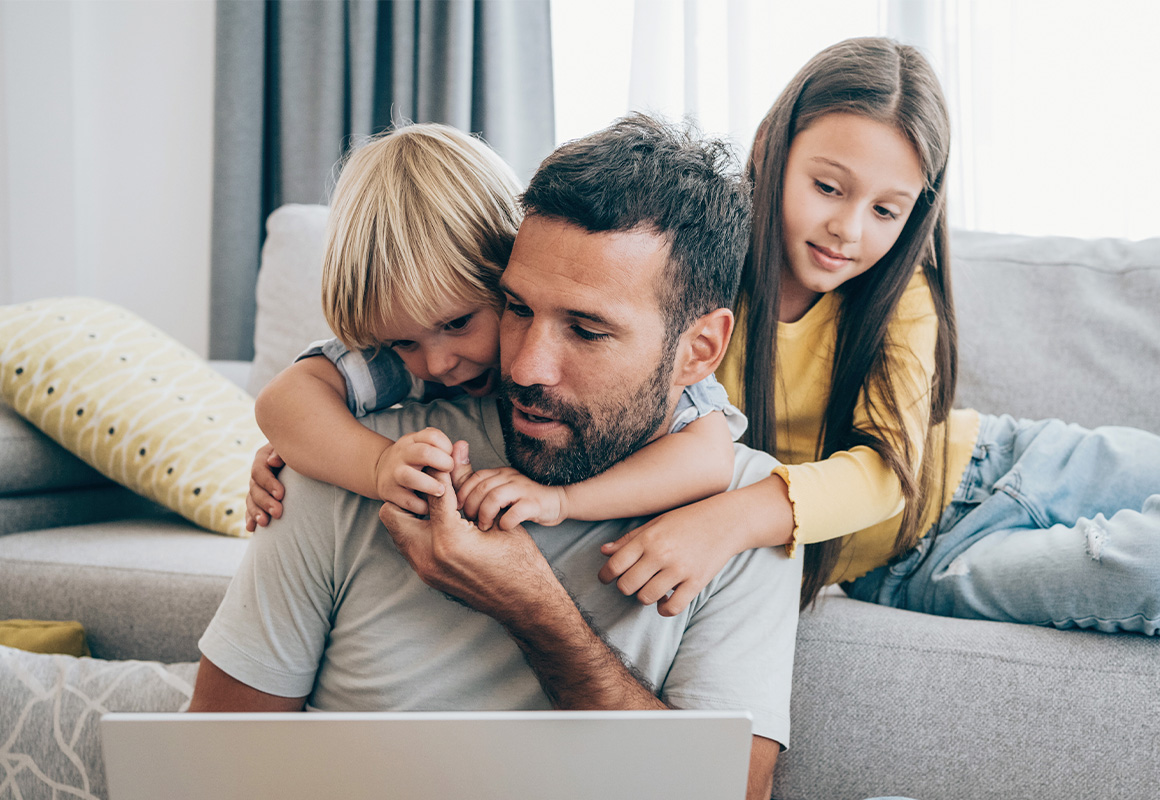 man with children at home