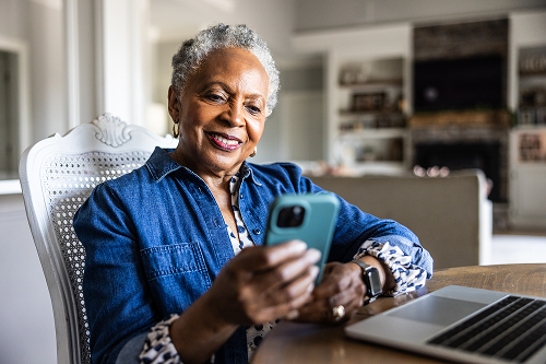 Older woman on phone at home