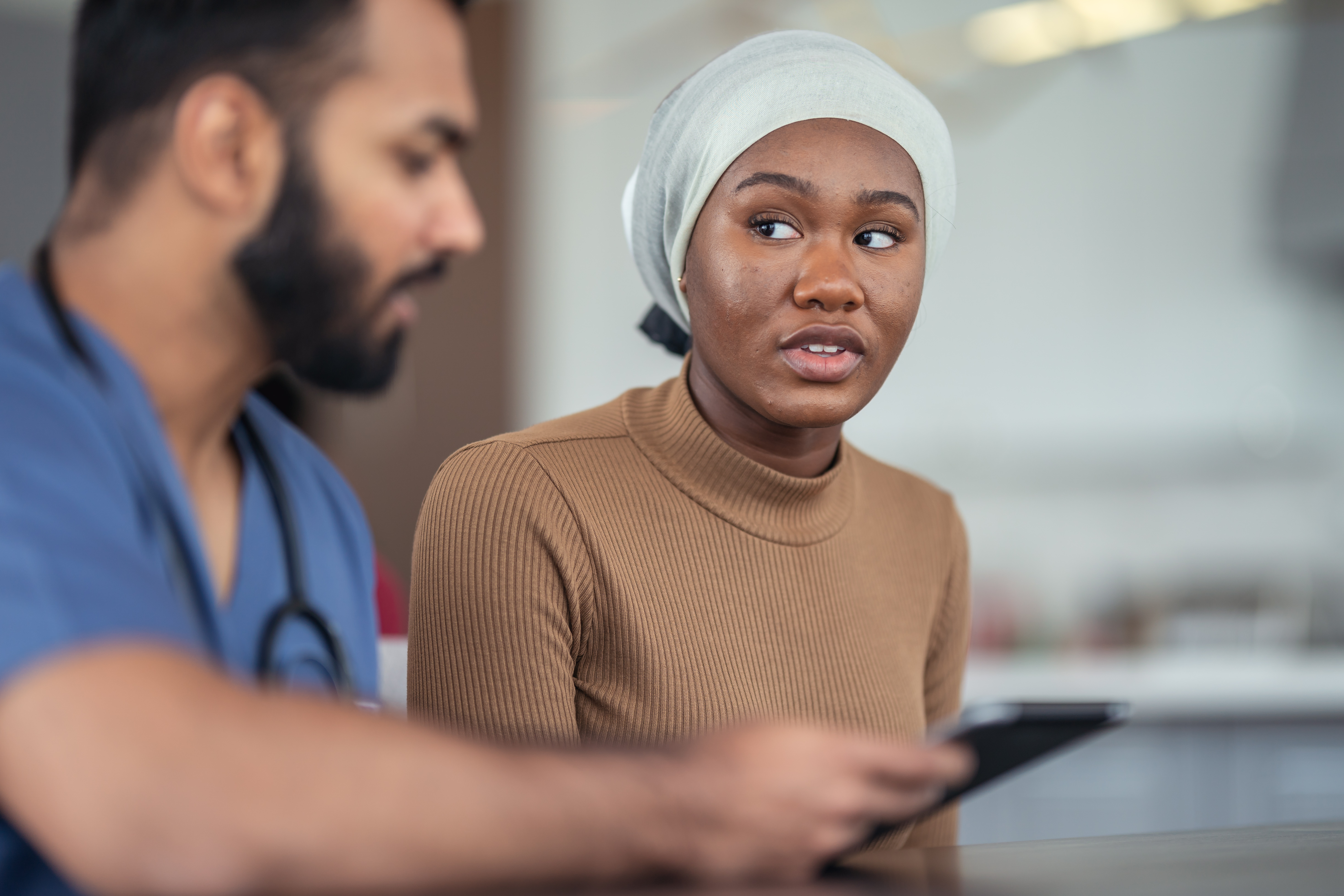 black female cancer patient with physician