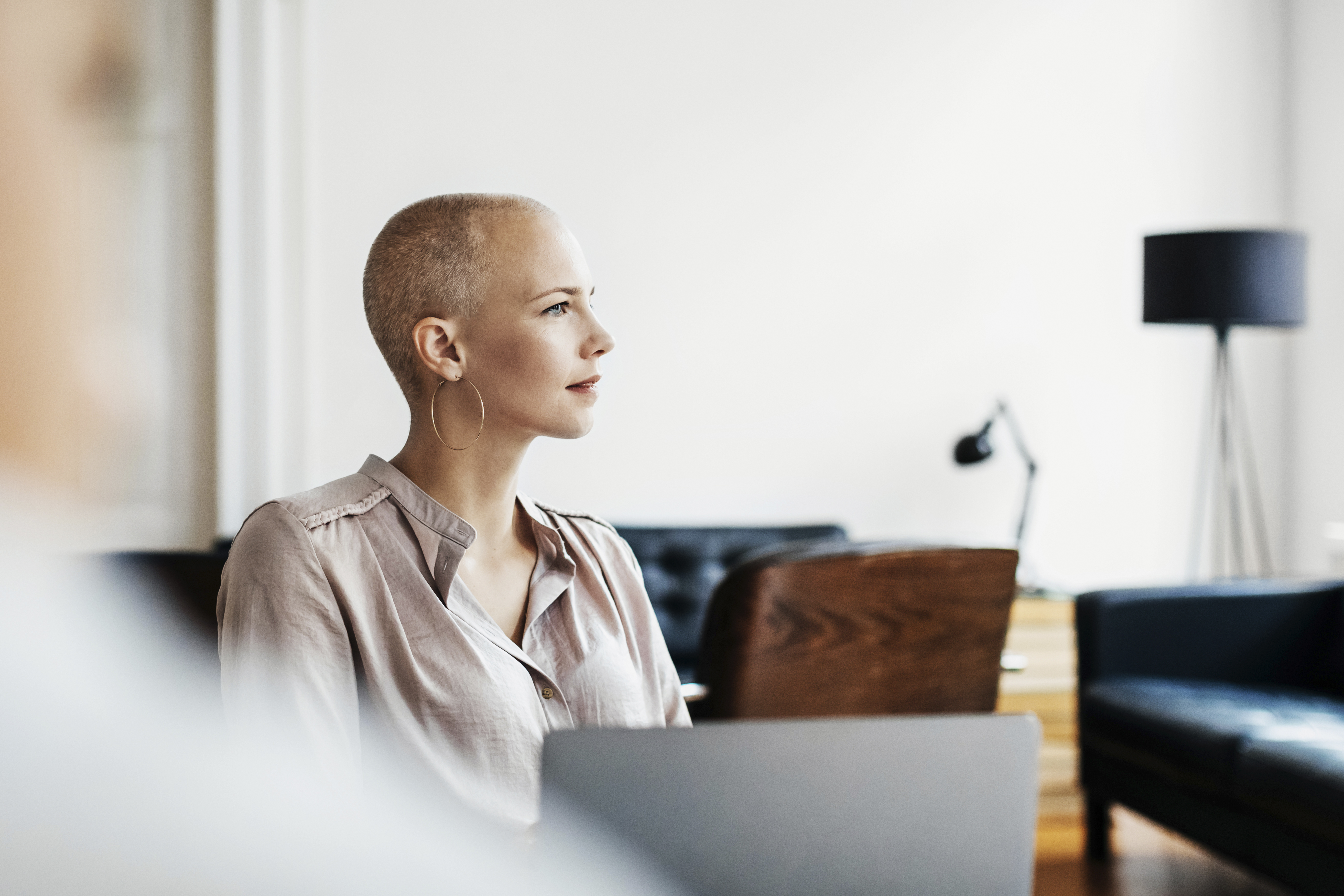 female cancer patient looking to side