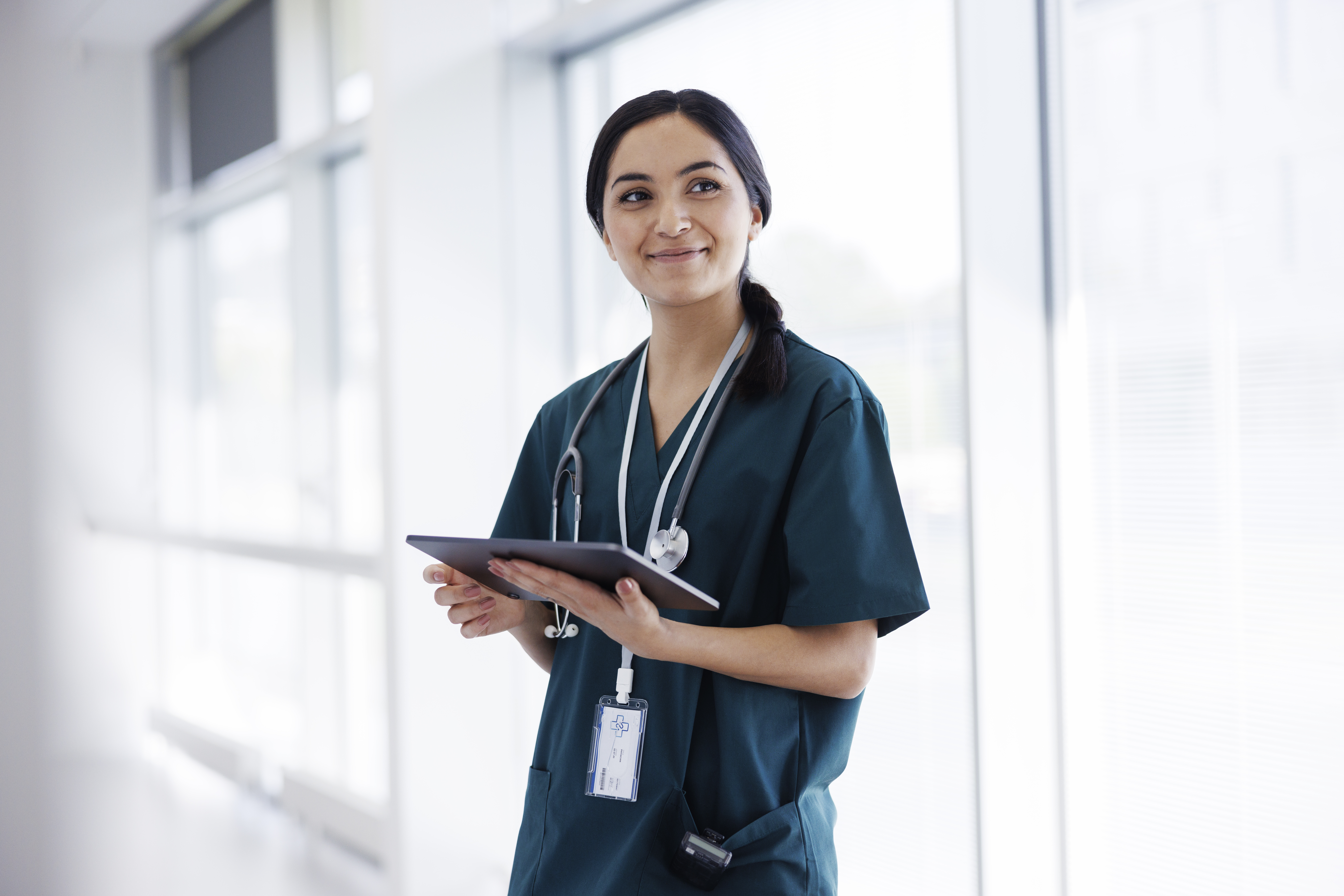 female physician with tablet
