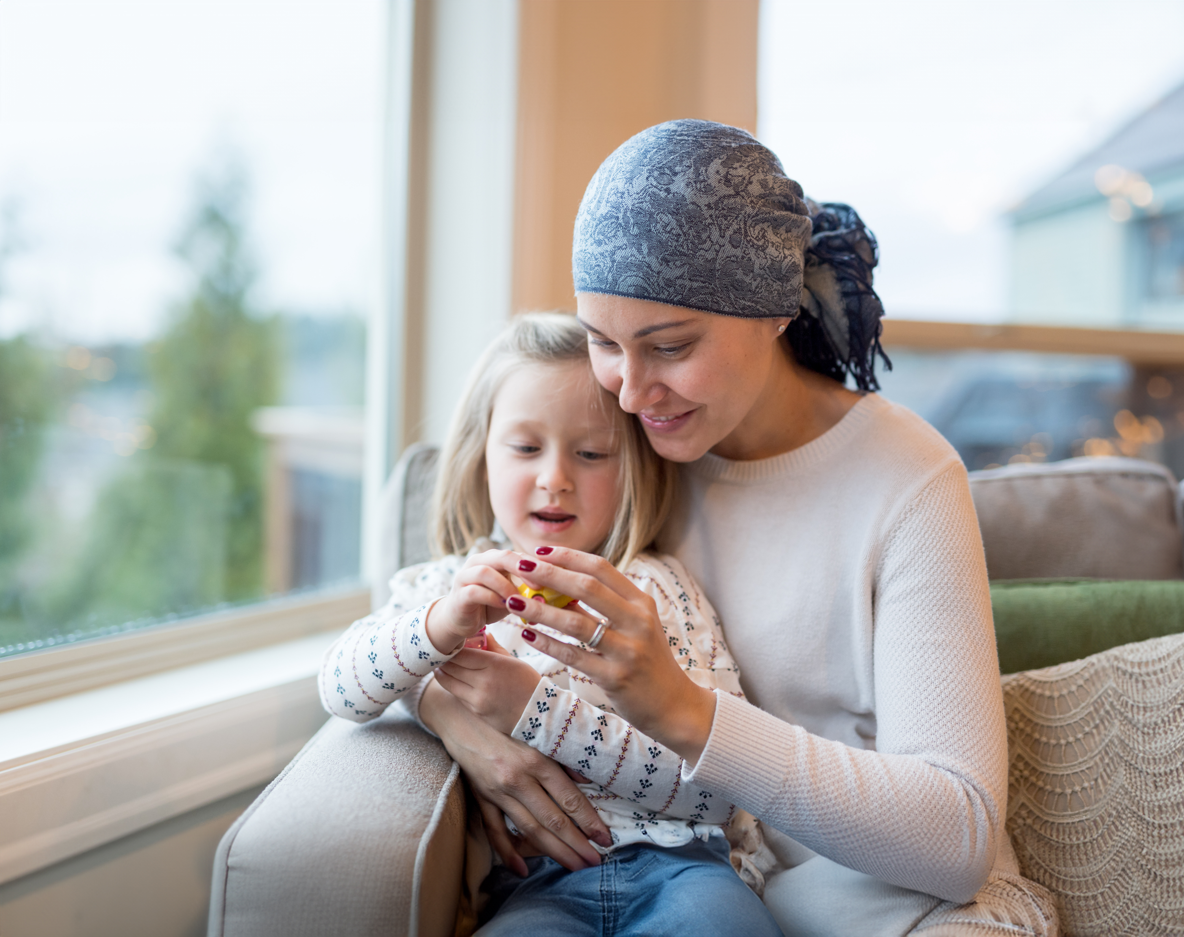 female cancer patient with child
