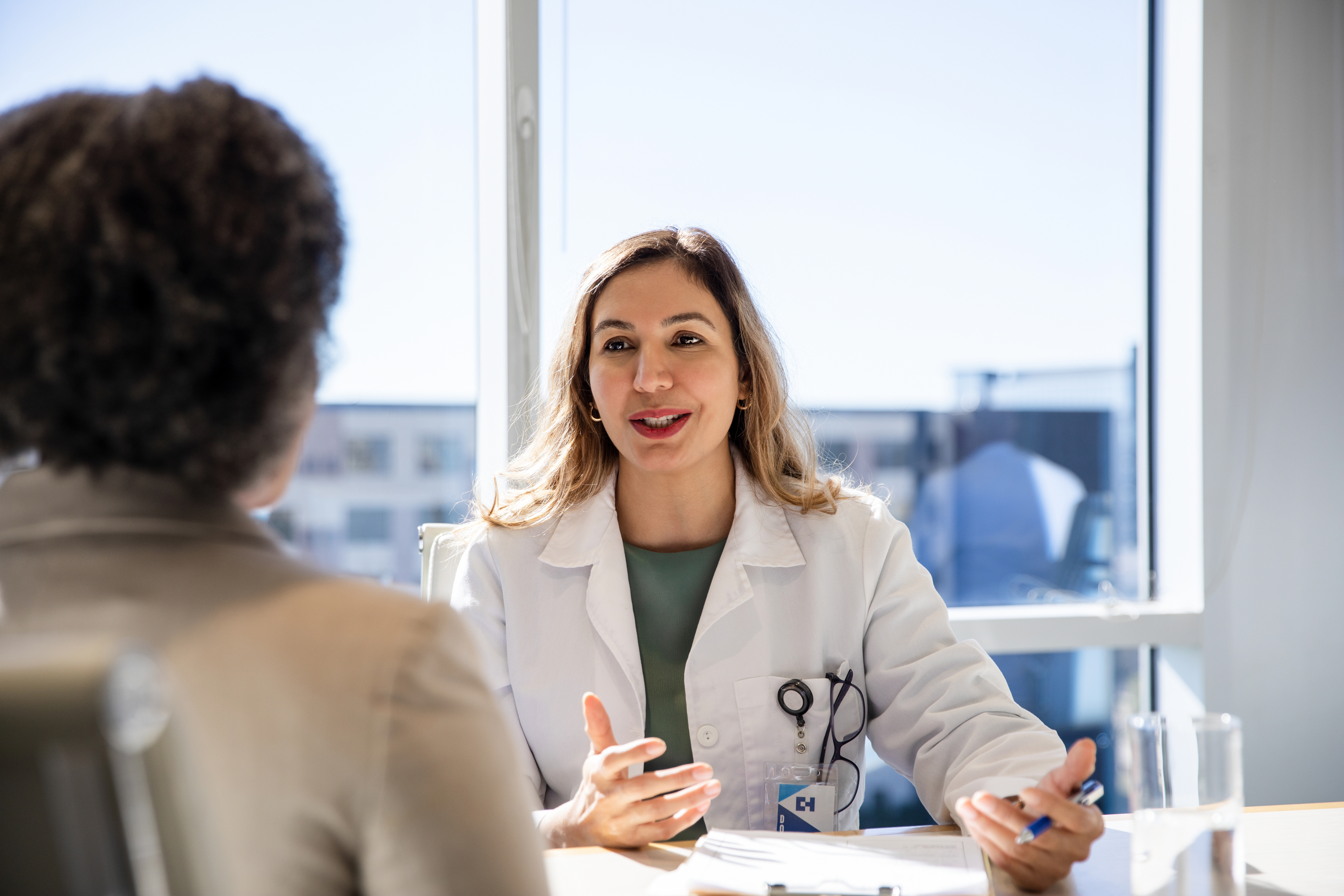 female doctor speaking to patient