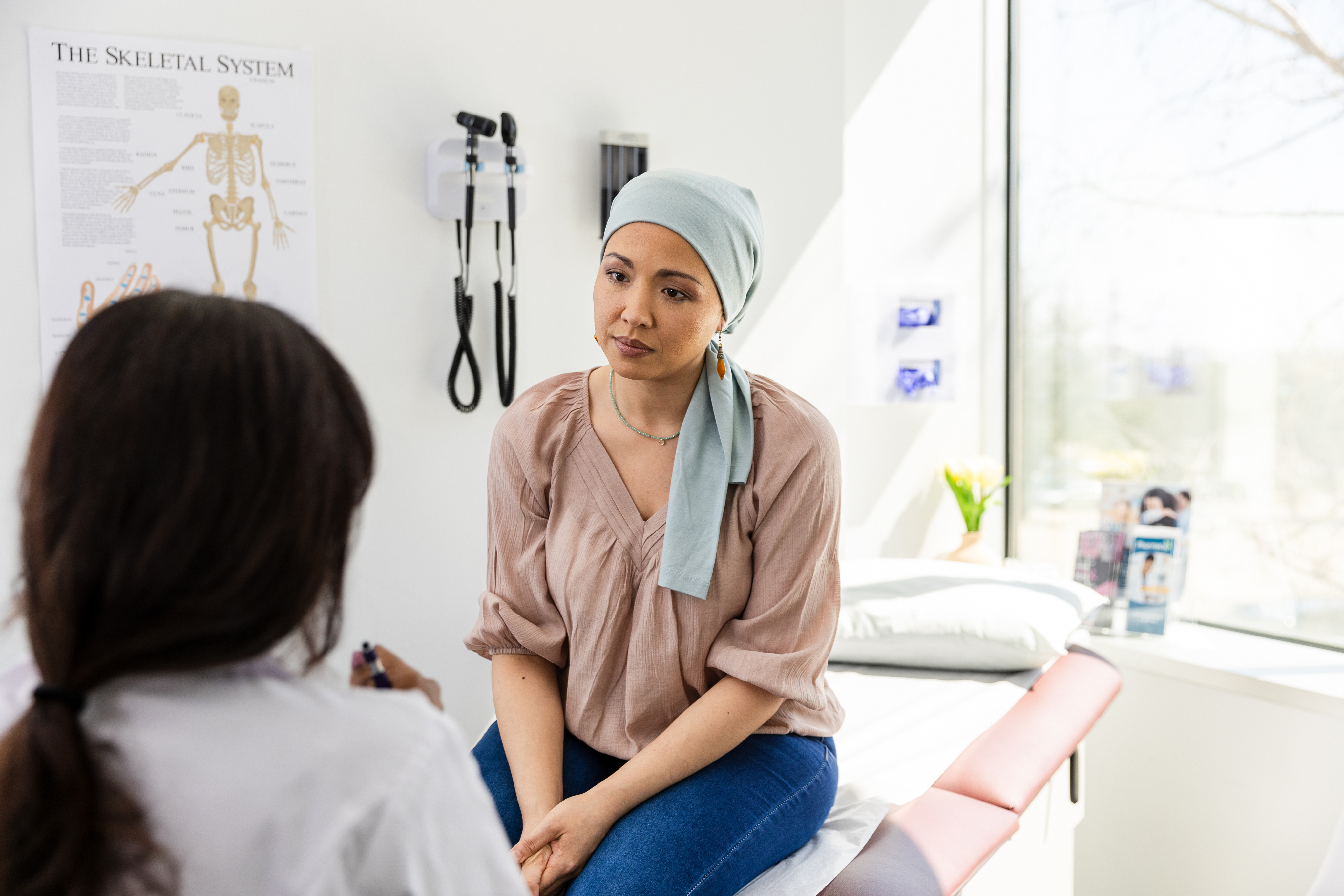 female cancer patient with physician
