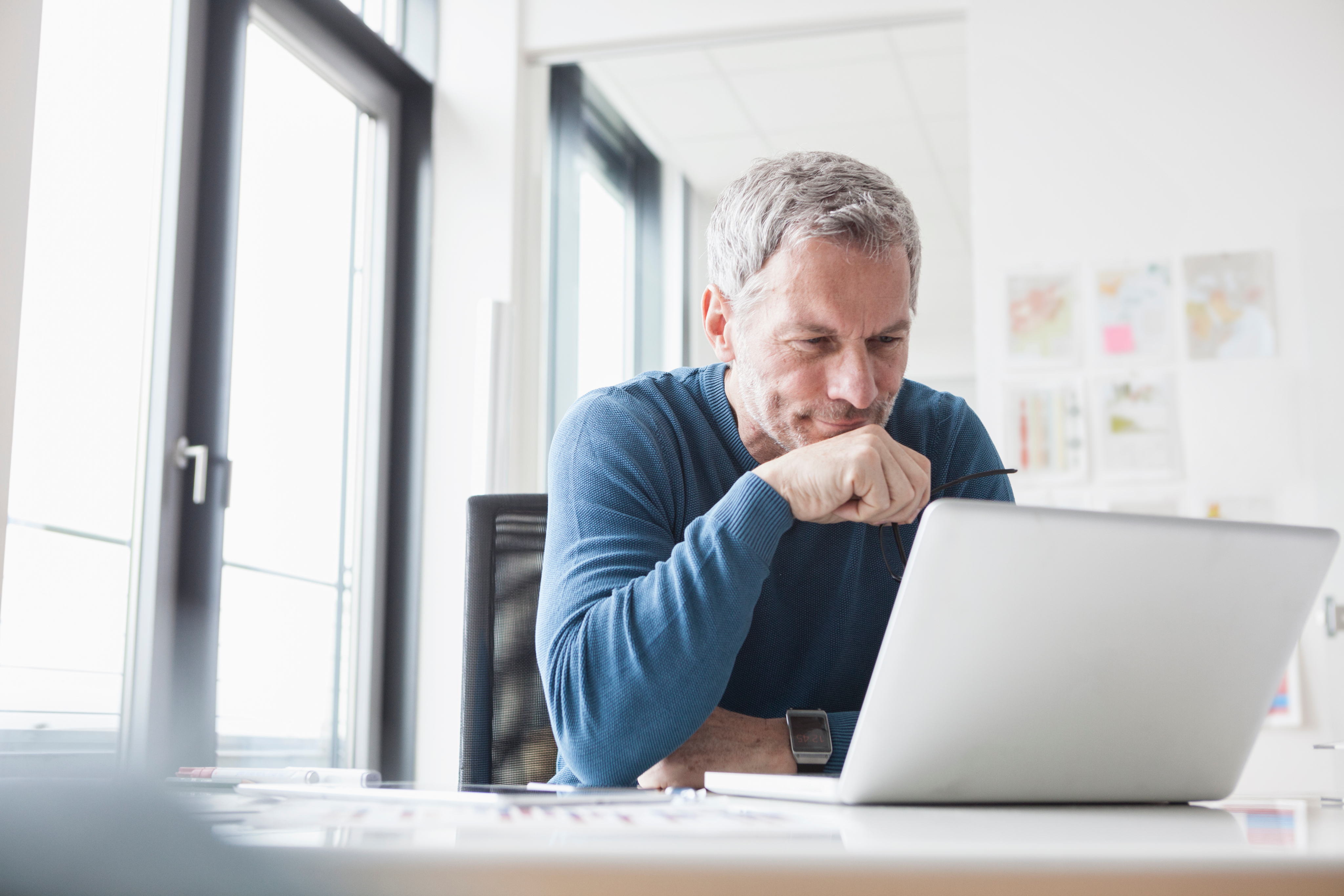 Man at home on laptop
