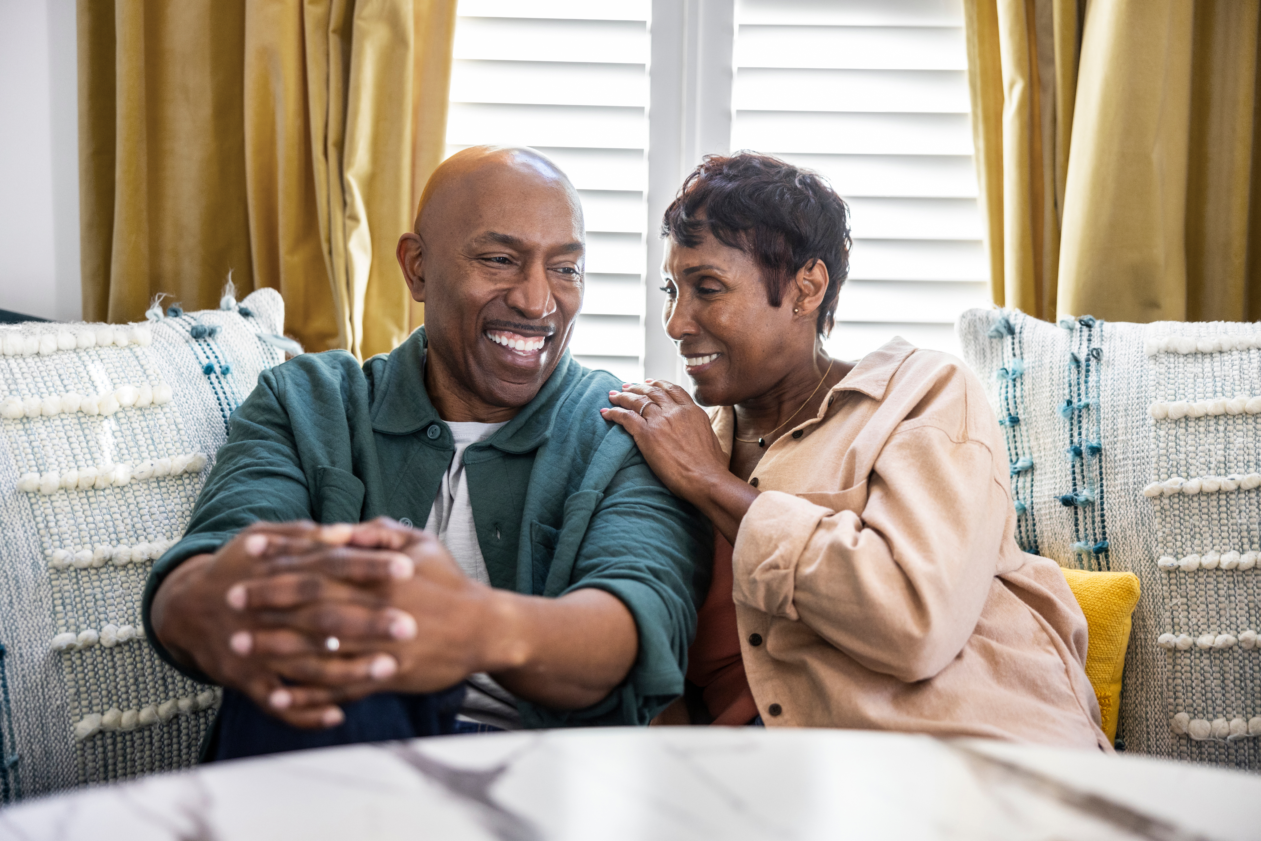 man and woman laughing