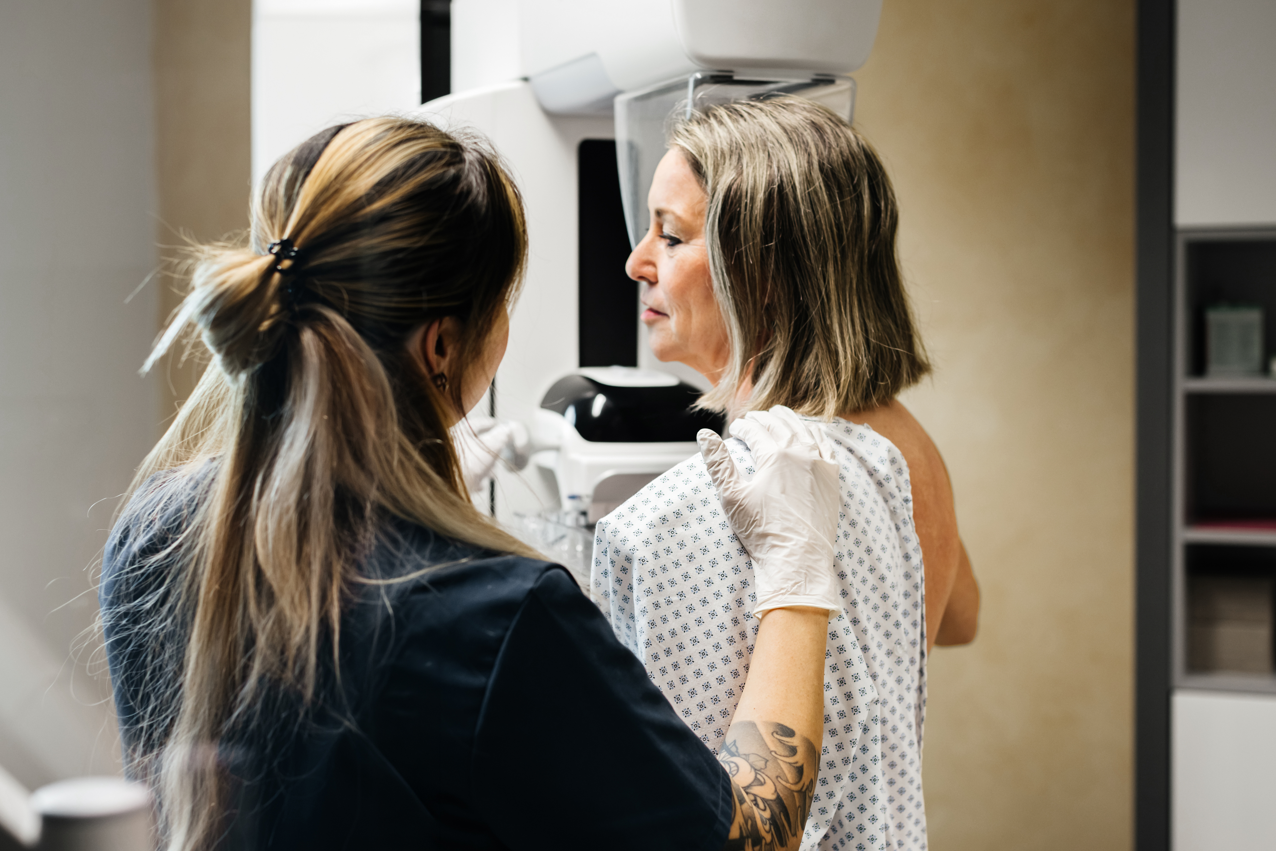 woman getting mammogram