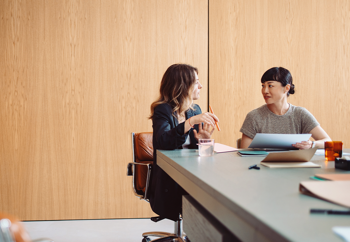 two women at a desk