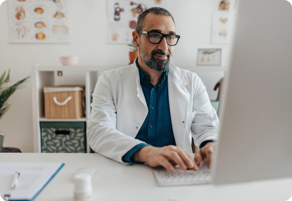 doctor working on computer